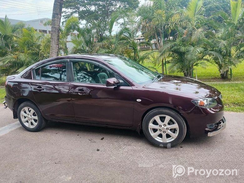 Mazda Axela . 2004