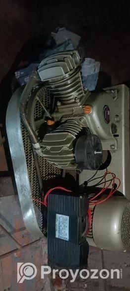 Piston air compressor