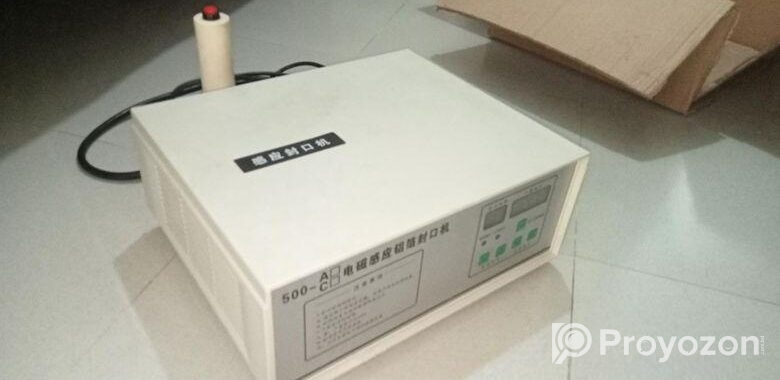Induction sealing machine