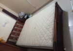 A Regal bed and side drawer
