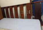 A Regal bed and side drawer