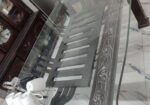 ডাইনিং টেবিল উইথ গ্লাস টপ এবং ৬ টি চেয়ার।