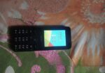 Axion button phone (Used)