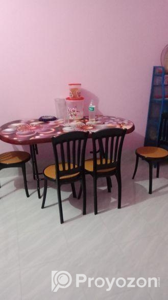 একটি খাট,একটি ডাইনিং টেবিল, ৪ টা চেয়ার ও একটা ডেসিন টেবিল