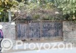 6.3 acres of land surrounded by a wall on the proposed 30 feet si
