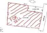 6.3 acres of land surrounded by a wall on the proposed 30 feet si