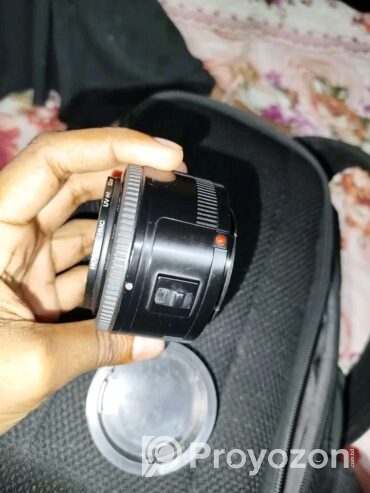 একটি YN 50 mm প্রাইম লেন্স বিক্রি করা হবে