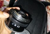 একটি YN 50 mm প্রাইম লেন্স বিক্রি করা হবে