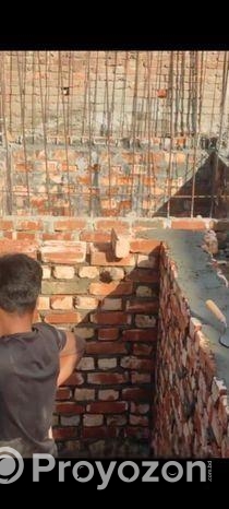 বিগত ছয় মাস পূর্বে নির্মাণাধীন দুইতলা ভবন