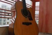 Full size professional acoustic gitar