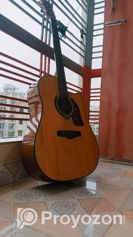 Full size professional acoustic gitar