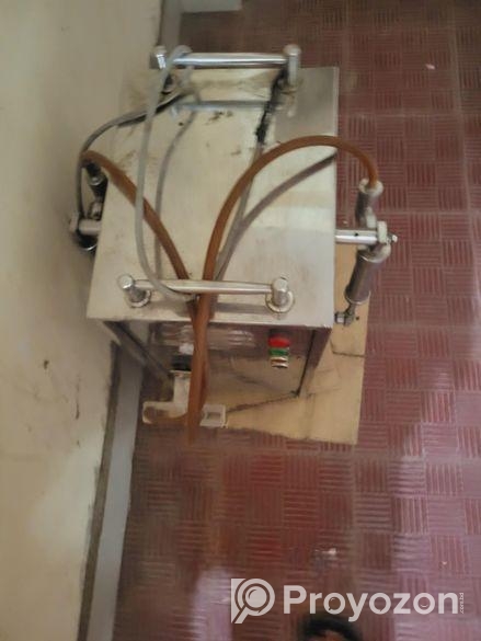 সেমি- অটোমেটিক লিকুইড ফিলার মেশিন