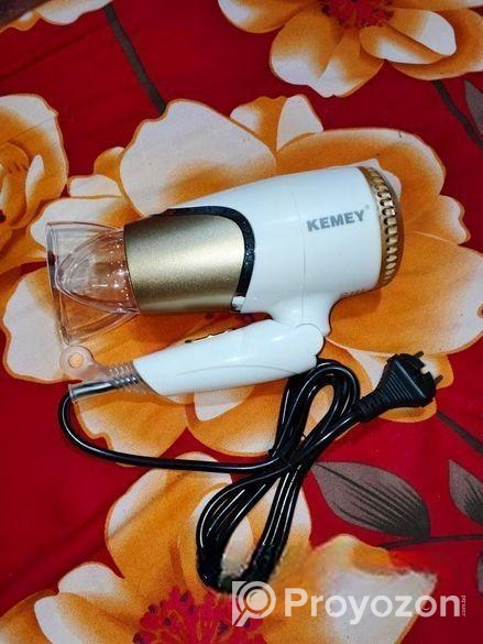 চুল শোকানোর মেশিন