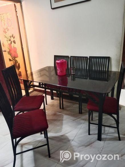 ৬ চেয়ারের পুরাতন লোহার ফ্রেমের উপরে গ্লাসের ডাইনিং টেবিল