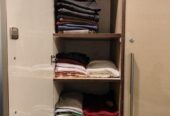 Large Closet with hydrolic doors and drawers