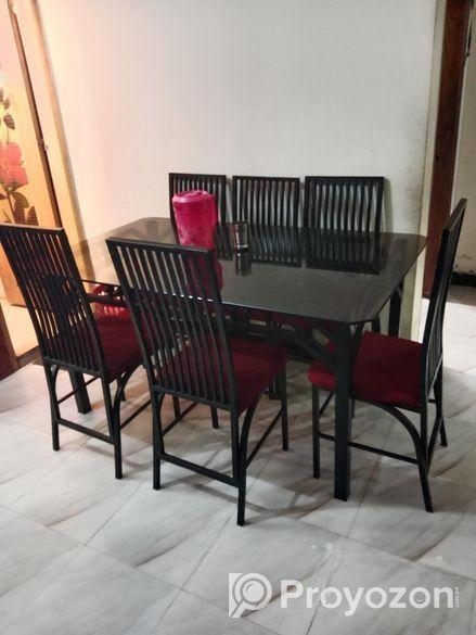 ৬ চেয়ারের পুরাতন লোহার ফ্রেমের উপরে গ্লাসের ডাইনিং টেবিল