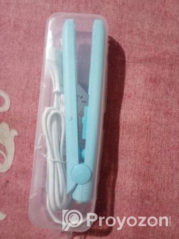 চুল সোজা করার মেশিন