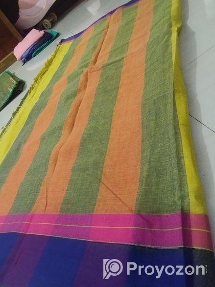 নীল পাড় হলুদ শাড়ি