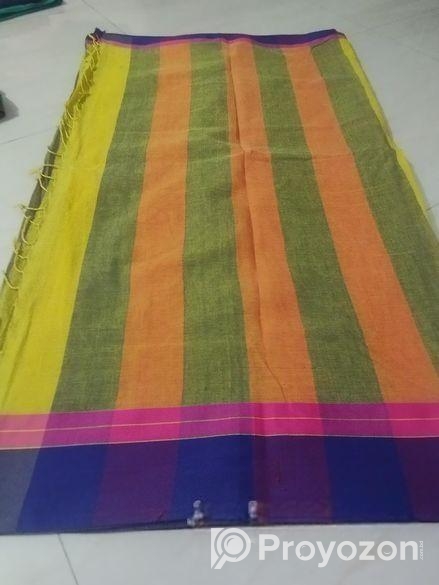 নীল পাড় হলুদ শাড়ি