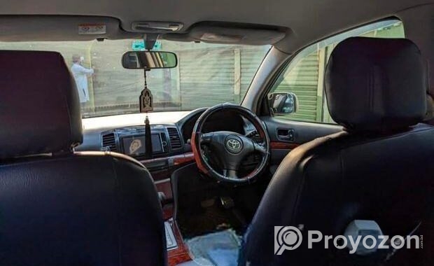 Toyota Premio . 2003