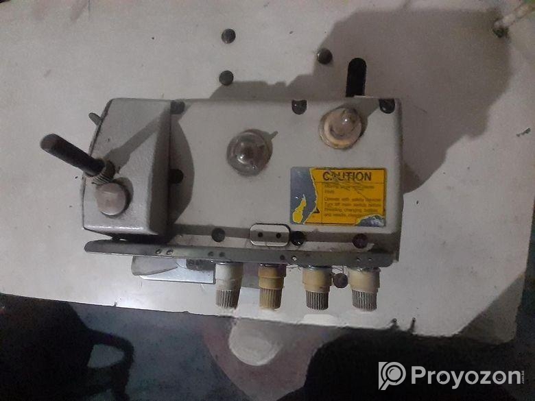 ৪ সুতা ওভার লক মেসিন