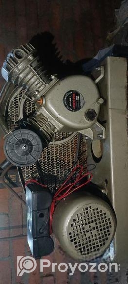 Piston air compressor