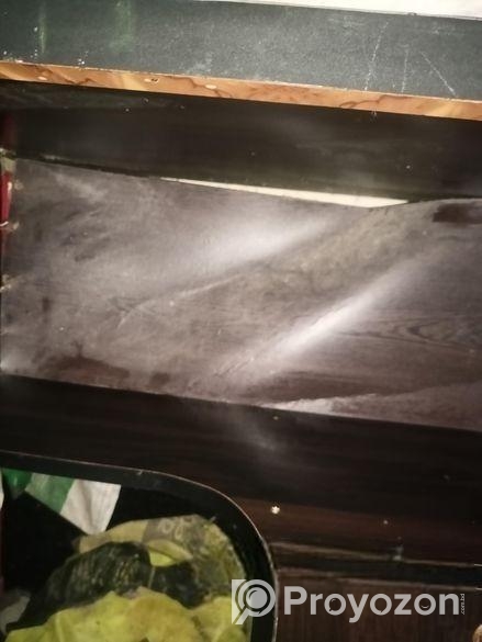 পড়ার টেবিল। একটা রেক।