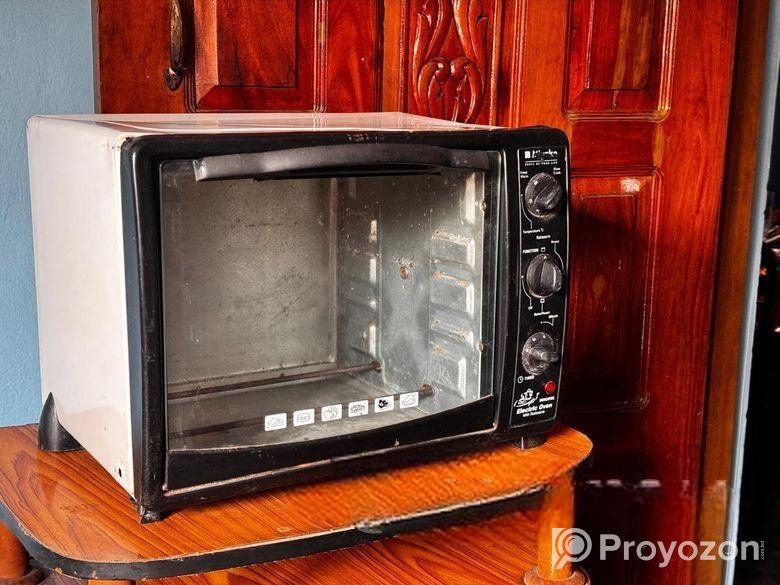 একটি পুরাতন সম্পুর্ন ফ্রেশ রানিং ইলেকট্রিক ওভেন বি