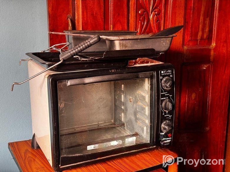 একটি পুরাতন সম্পুর্ন ফ্রেশ রানিং ইলেকট্রিক ওভেন বি