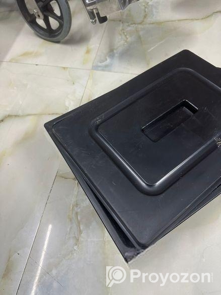 WHEEL CHAIR WITH POT almost new branded