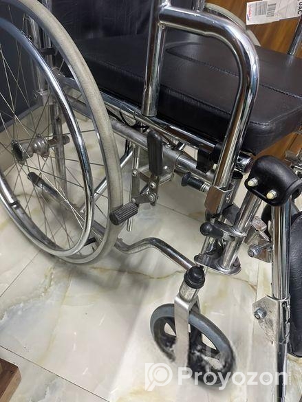 WHEEL CHAIR WITH POT almost new branded