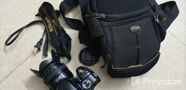 Nkkon D3300 এবং 50mm লেন্স সহ ক্যামেরা দিচ্ছি সূলভ