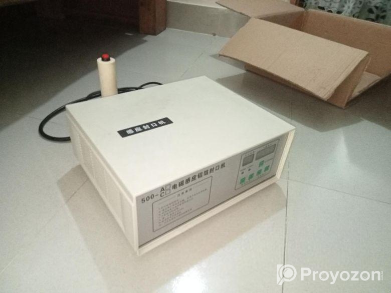 Induction sealing machine