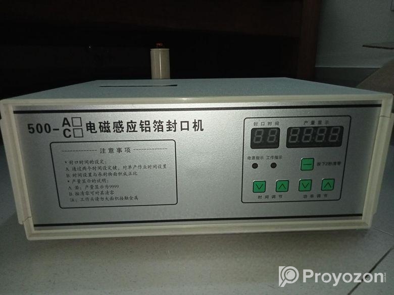 Induction sealing machine