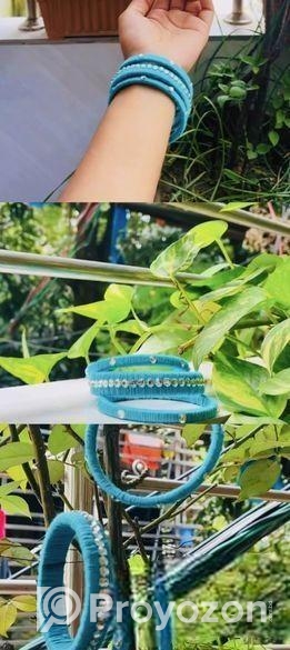 আকাশি রঙের হাতে বানানো সুন্দর পাথর জড়ানো চুড়ি