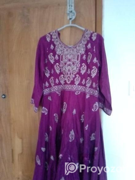 Beautiful purple long dress with intricate golden embroidery