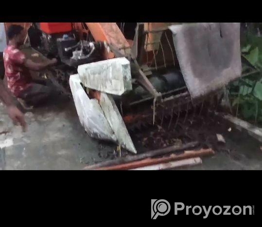 ধান কাটার মেশিন