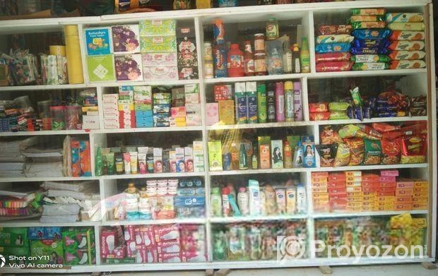 আবাসিক এলাকায় যে বিল্ডিং এর নিচে দোকান।