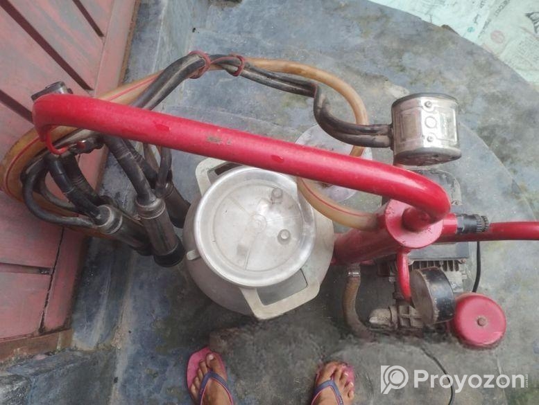 গাভীর দুধ দোহান মেশিন