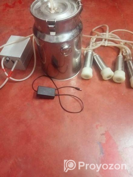 গাভি দোয়ানোর মেশিন