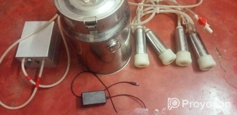 গাভি দোয়ানোর মেশিন