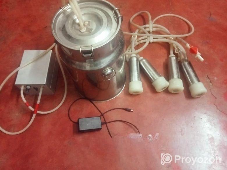 গাভি দোয়ানোর মেশিন