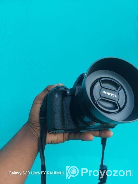 canon 800D with 50mm prime lens 1.8..