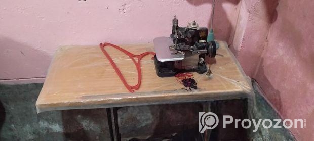ওভার লক মেশিন