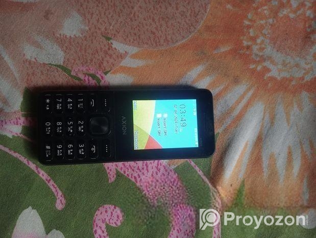 Axion button phone (Used)