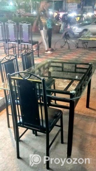 ছয় পিস চেয়ার সহ টেন মিলি গ্লাস ডাইনিং টেবিল (daining able)