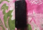Axion button phone (Used)