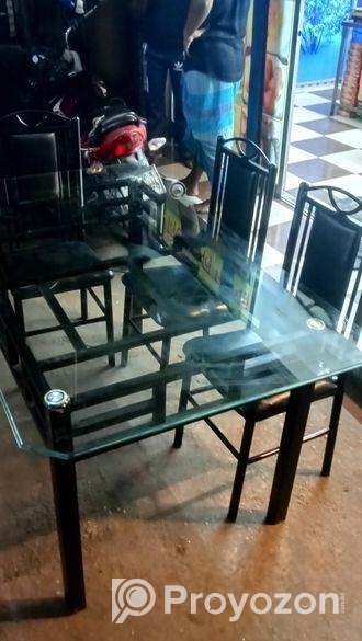 ছয় পিস চেয়ার সহ টেন মিলি গ্লাস ডাইনিং টেবিল (daining able)