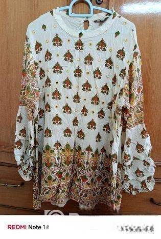 লা রিভ(টপস)